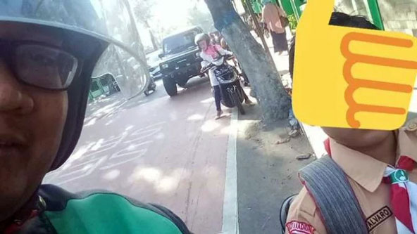 Keren, Naik Pengemudi Gojek Ini Bayarnya Cukup Surat Al Baqarah 183