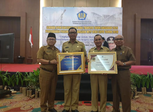 Hadiri Seminar APBN, Bupati Suyatno Terima Penghargaan WTP Tahun 2018