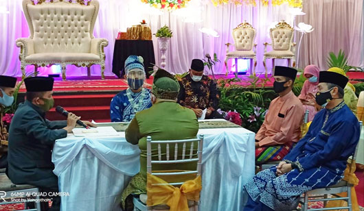 Hadir di Resepsi Pernikahan Putri Ketua JMSI Riau, Gubri Ingatkan Bahaya Covid-19