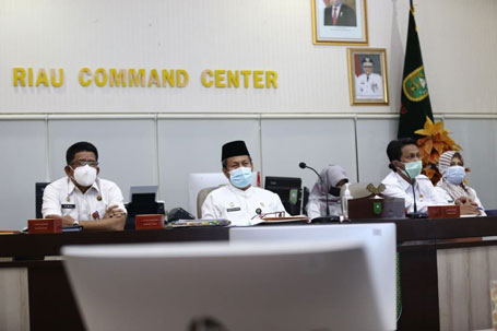 Plh Sekdaprov Riau Ikuti Rapat Implementasi Permendagri Nomor 6 Tahun 2021 Secara Virtual