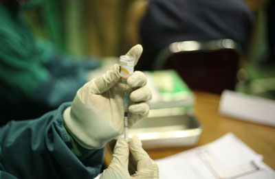 Kolaborasi Vaksinasi Bagi Pedagang Pasar di Pekanbaru