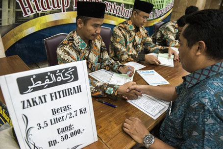 Bacaan Niat Zakat Fitrah saat Mewakili Orang Lain