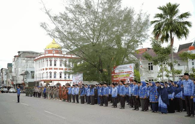 Pimpin Upacara Harkitnas, Bupati Rohil Sampaikan Amanat Menteri Kominfo