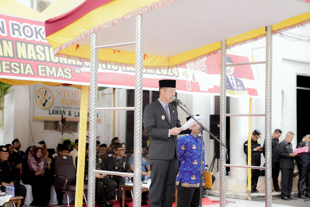 Jadi Inspektur Upacara Harkitnas, Bupati Rohil Sampaikan Amanat Menteri Kominfo RI