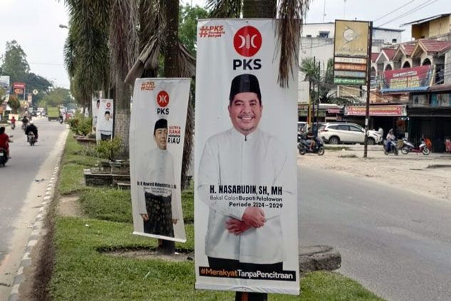 Mahasiswa Pecinta Alam Sorot Oknum Politikus Pasang Banner Kampanye di Pohon