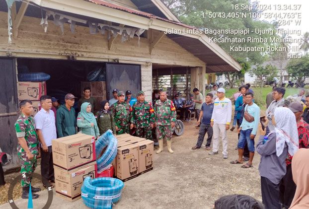 5 Anggota Koramil 0321-05/RM Lakukan Pendampingan Bantuan Mesin Pompa Air Kepada Gapoktan