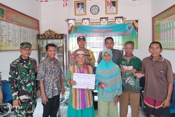 Babinsa 0321-05/RM Kembali Dampingi Penyaluran BLT DD 2024 Desa Bangko Makmur