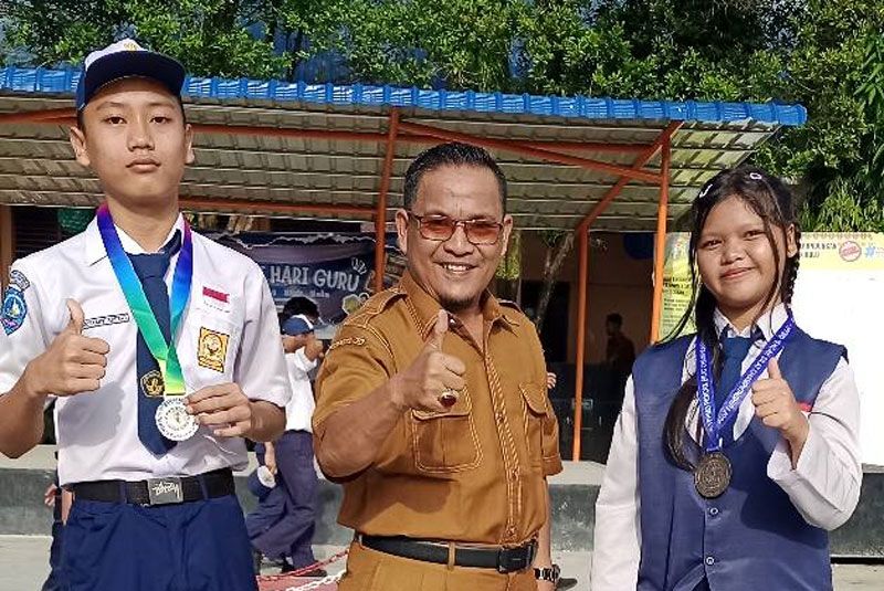 Dua Siswa-siswi UPT SMP Negeri 4 Siak Hulu Catat Prestasi Cabor Tenis Meja dan Pencak Silat