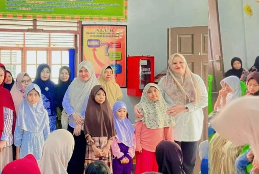 Camat Senapelan Salurkan Sembako di Padang Bulan