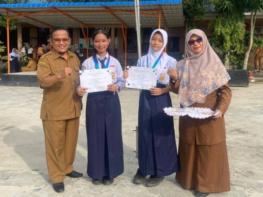 Dua Siswi UPT SMP Negeri 4 Siak Hulu Sabet Medali pada Olimpiade Pelajar Berprestasi Indonesia
