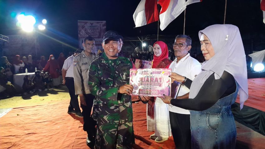 Babinsa Koramil 06/Siak Hulu Hadiri Malam Puncak Peringatan HUT RI ke-81 Desa Tanah Merah